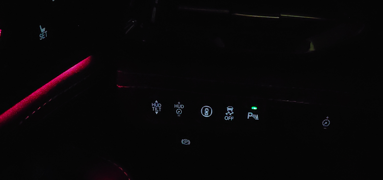 Acura MDX left-lower driver control panel with HUD tilt, parking, and stability controls