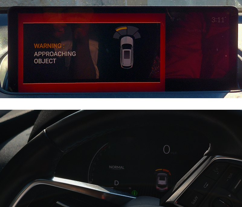Approaching Object proximity warning on the Acura MDX central display with mirrored cluster indicator