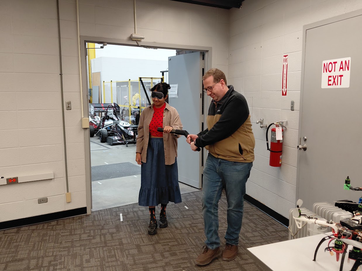 Researcher handing over the guidance handle