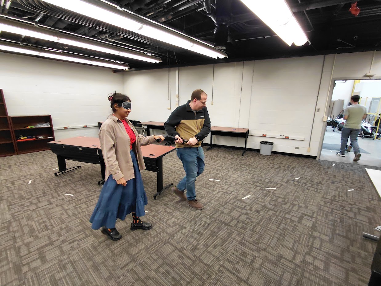 Experimental session: blindfolded participant guided by the quadruped robot
