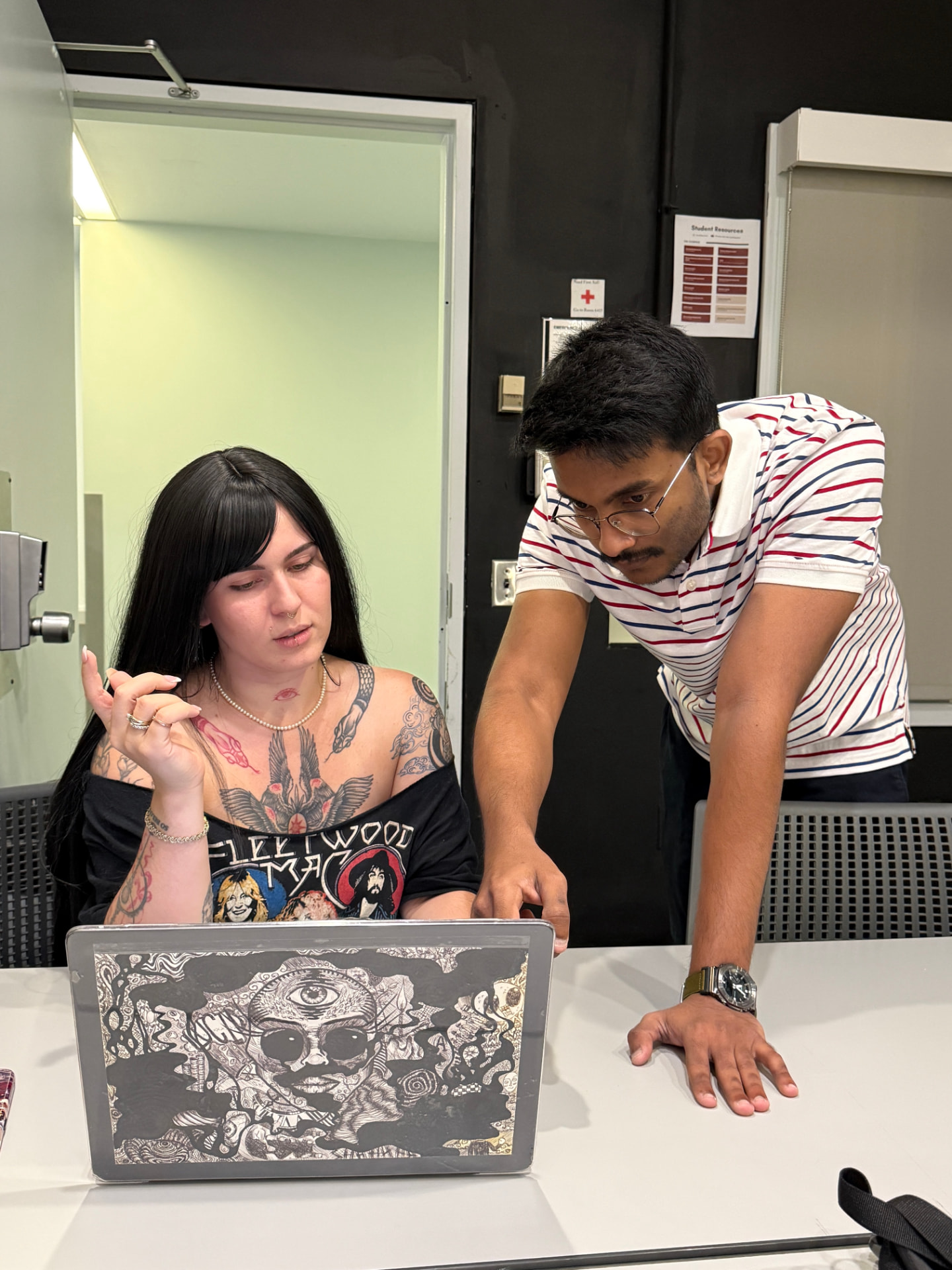 One-on-one desk-side support with a student